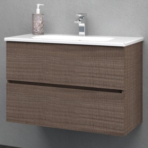 Mobile bagno sospeso effetto legno con lavabo e rubinetto.