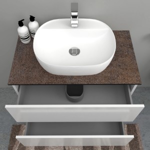 Mobile lavabo con lavabo d'appoggio, piano marrone e cassetti bianchi.