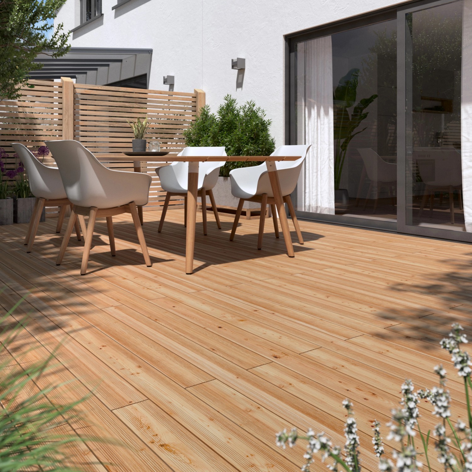 Terrazza con listoni per decking in douglasia 2.1x12x200cm e mobili da giardino.