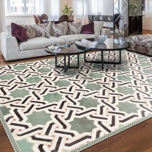 Tappeto moderno con motivo a stella verde in soggiorno.