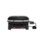 Grill elettrico Weber Lumin Compact nero con coperchio chiuso.