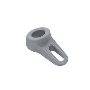 Fermaporta t.b.t. grigio con superficie scanalata e foro per il montaggio della porta.