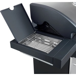 Dettaglio del barbecue a gas t.b.t. con griglia scaldavivande aperta.