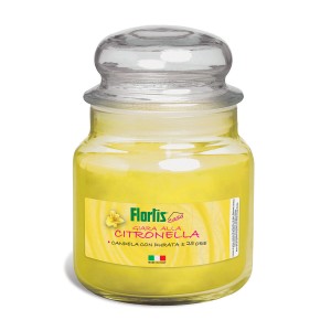Candela profumata alla citronella gialla in barattolo di vetro con coperchio.