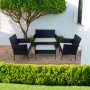 Set di mobili da giardino t.b.t. nero con tavolo, divanetto e due sedie.