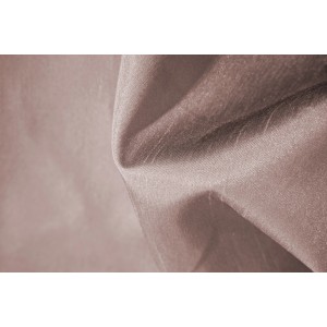 Primo piano del tessuto beige della tenda t.b.t. Struttura tessile visibile.