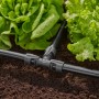 Sistema di irrigazione t.b.t. per irrigazione sotterranea in giardino.