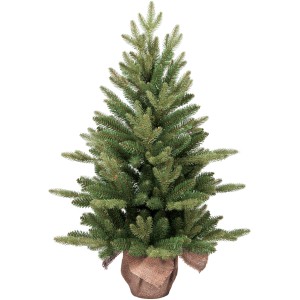 Piccolo albero di Natale artificiale verde in sacco di iuta per interni.