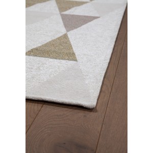 Tappeto moderno con motivo geometrico a triangoli nei toni del beige e del bianco.