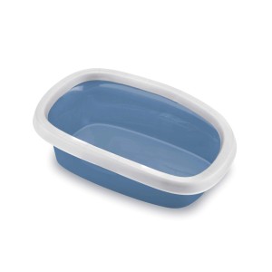 Toilette per cani blu con bordo bianco. Pratica toilette per cuccioli e cani di piccola taglia.