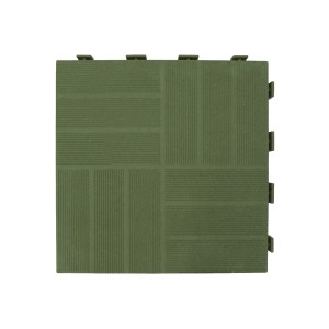 Piastrella autobloccante t.b.t. verde per esterni, ideale come pavimentazione.