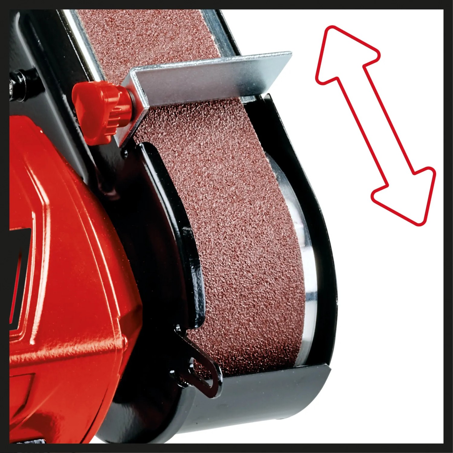 Dettaglio: Levigatrice a nastro Einhell TC-US 350 con nastro abrasivo e freccia che indica la direzione di marcia.