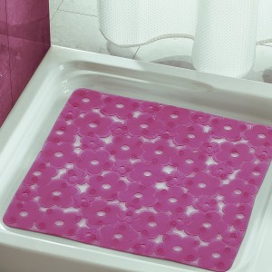 Tappetino da bagno rosa con motivo floreale per una maggiore sicurezza durante la doccia.