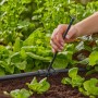 Tubo di prolunga Gardena (20 cm) per ugelli a spruzzo in uso nell'orto.