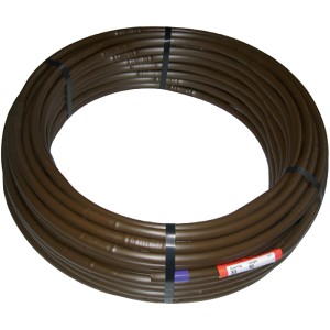 Bobina di tubo PE marrone per irrigazione interrata, legata insieme.