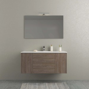 Set di mobili da bagno moderni con mobile lavabo, specchio e illuminazione.