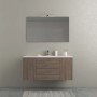 Set di mobili da bagno moderni con mobile lavabo, specchio e illuminazione.