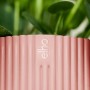 Vaso per piante Elho Vibes Fold, Ø 25 cm, rosa tenue con texture a coste.
