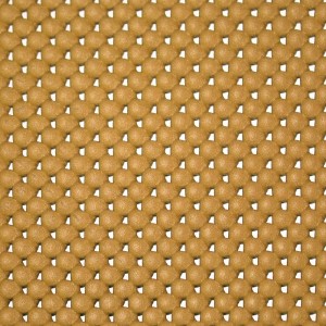 Tappeto schiumato con fori beige al metro