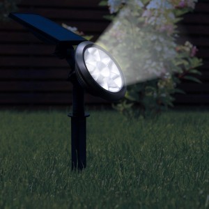Lampada solare nera in giardino, illuminazione decorativa per esterni.