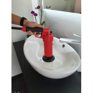 Pulitore per tubi ad aria compressa Rothenberger Industrial in uso su un lavabo.