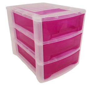 t.b.t. Cassettiera con tre cassetti in rosa e struttura trasparente.