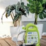 Avvolgitubo verde con spruzzatore per balcone e terrazza.