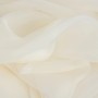Tessuto fine e leggermente trasparente in bianco crema, adatto per tende leggere.