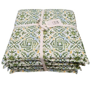 t.b.t. federe cuscino con motivo verde e giallo, impilate e legate con nastro.