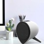 Termoventilatore elettrico t.b.t. bianco e rotondo con griglia nera su una scrivania.