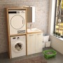 Lavatrice e asciugatrice in set di mobili bagno con lavabo e specchiera.