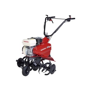 Motozappa rossa con motore e zappe nere.