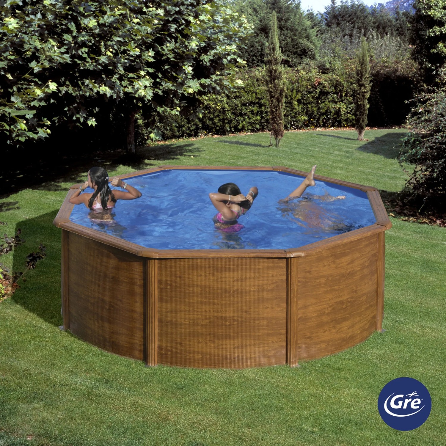 Piscina rotonda Gre Pool Sicilia effetto legno (Ø 350 cm), bambini che nuotano nella piscina da giardino.