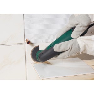 LUX Lama per sega a segmenti HM 85 mm in uso per la rimozione di residui di colla per piastrelle.