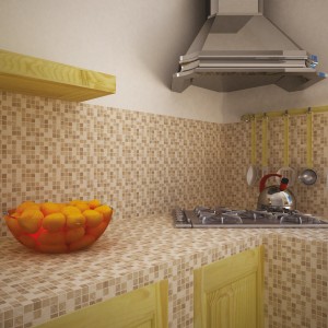Alzatina e piano di lavoro cucina con piastrelle mosaico t.b.t. in beige e marrone.