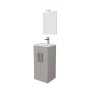 Mobile bagno grigio con specchio e rubinetto.