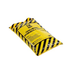Sacco di membrana liquida t.b.t., giallo con strisce di avvertimento. Conglomerato bituminoso a freddo.
