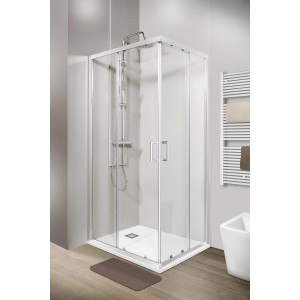 Box doccia angolare con ante scorrevoli e set doccia in bagno moderno.