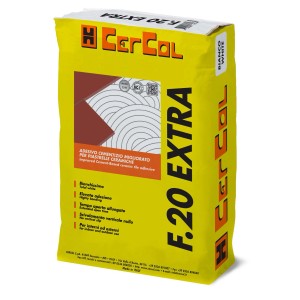 Sacco giallo di adesivo per piastrelle CerCol F.20 Extra.