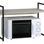 t.b.t. Scaffale da cucina con ripiano sopra un microonde.
