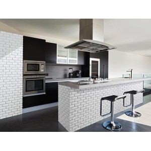 Cucina moderna con rivestimento Manhattan bianco effetto mattone su parete e isola.