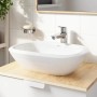 Miscelatore lavabo Grohe QuickFix Start XL su lavabo d'appoggio in bagno.