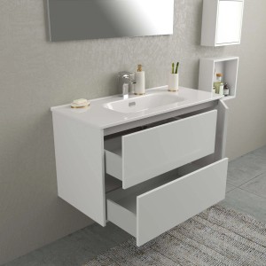 Mobile bagno bianco con due cassetti aperti, parte della serie di arredo bagno.