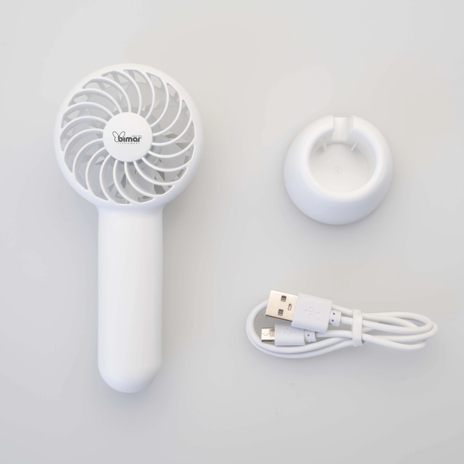 Ventilatore portatile bianco t.b.t. con cavo USB e supporto.