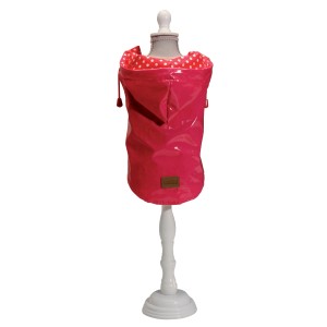 Abbigliamento per cani t.b.t. rosa con cappuccio e pois bianchi su manichino.