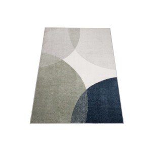 Tappeto moderno con motivo a cerchi in grigio, verde e blu.