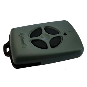 Telecomando t.b.t. per automazione porte garage, grigio con quattro pulsanti.