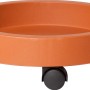 Sottovaso arancione con ruote per vasi. Pratico e mobile.
