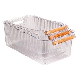 Set 3 contenitori bagno Wenko Nantes in plastica trasparente con manici in legno di faggio.