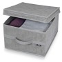 Organizzatore armadio t.b.t. grigio con coperchio, parzialmente aperto.